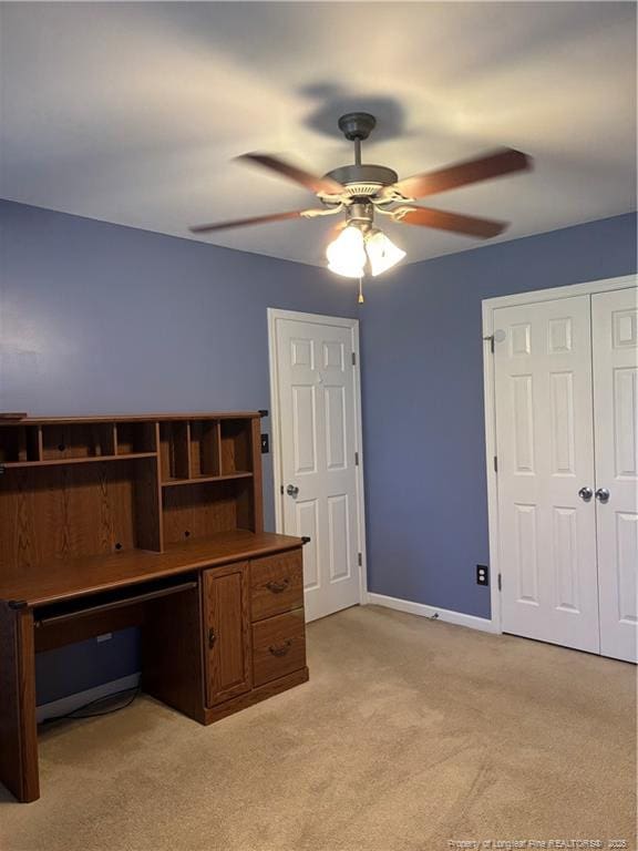 5733 Azure Dr, Hope Mills, NC 28348 - unfurnished office with light colored carpet, a ceiling fan, and baseboards