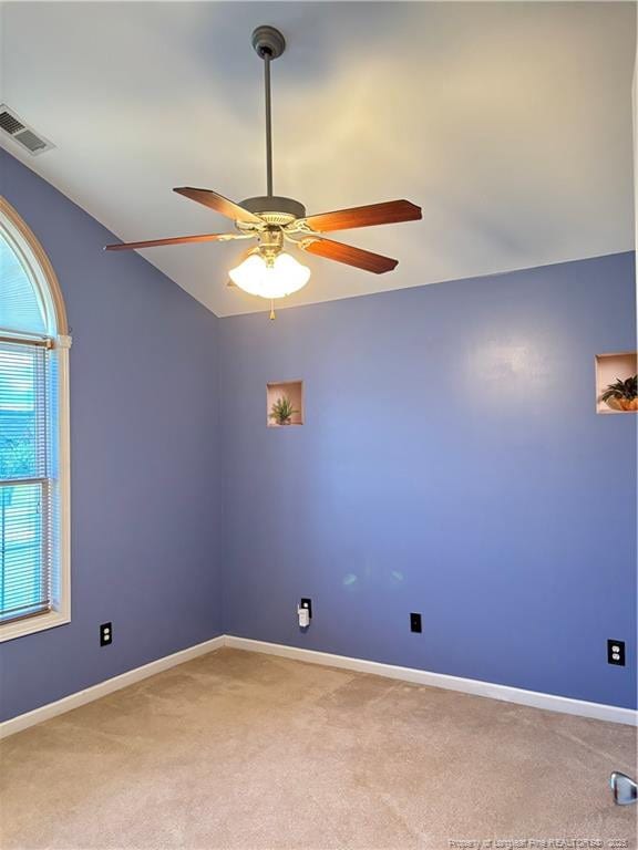 5733 Azure Dr, Hope Mills, NC 28348 - unfurnished room with a ceiling fan, light carpet, and baseboards