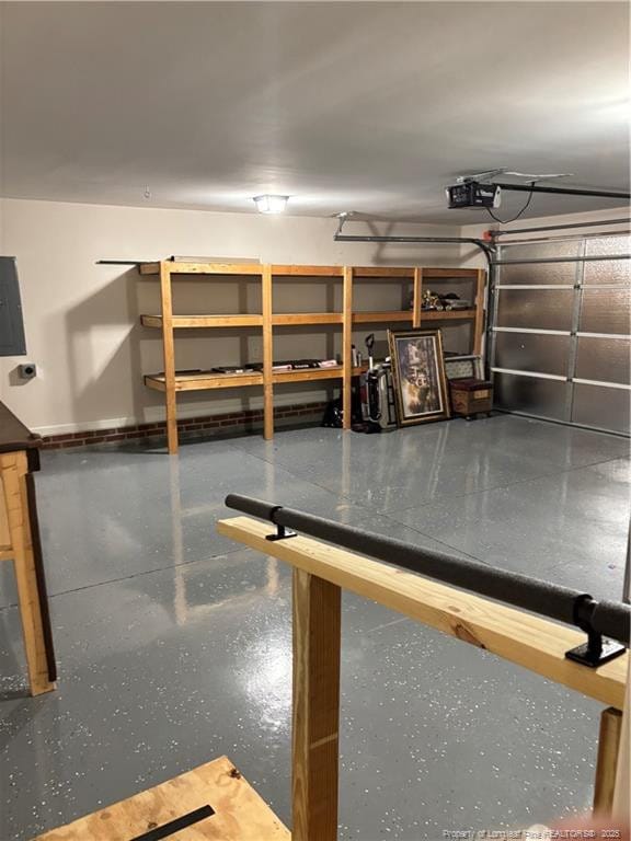 5733 Azure Dr, Hope Mills, NC 28348 - garage with a garage door opener, electric panel, and baseboards