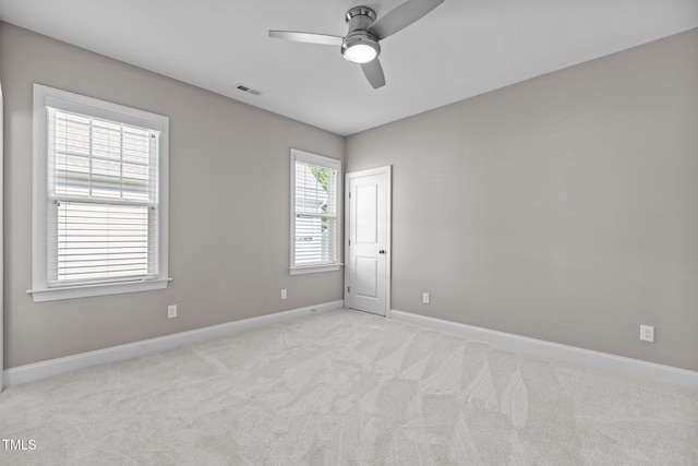 511 Mill Hopper Ln, Apex, NC 27502 - spare room featuring ceiling fan and light colored carpet