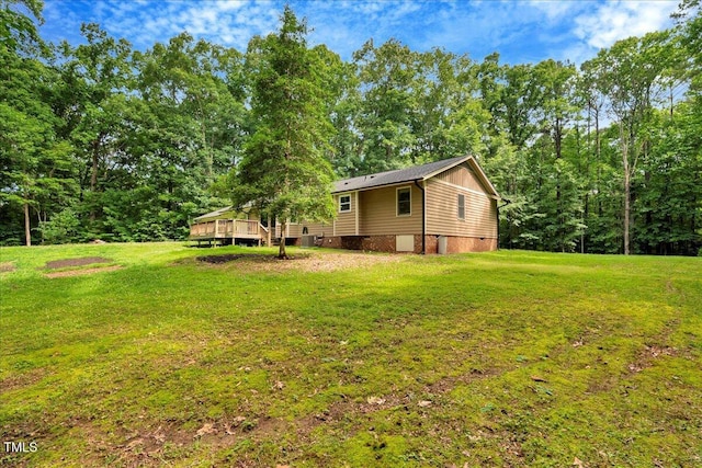 224 Oakcrest Dr, Wake Forest, NC 27587 - view of green lawn featuring a deck