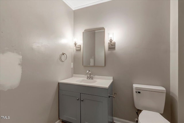 224 Oakcrest Dr, Wake Forest, NC 27587 - bathroom featuring vanity, toilet, and crown molding