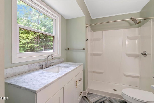 224 Oakcrest Dr, Wake Forest, NC 27587 - full bathroom with a shower, toilet, vanity, and crown molding