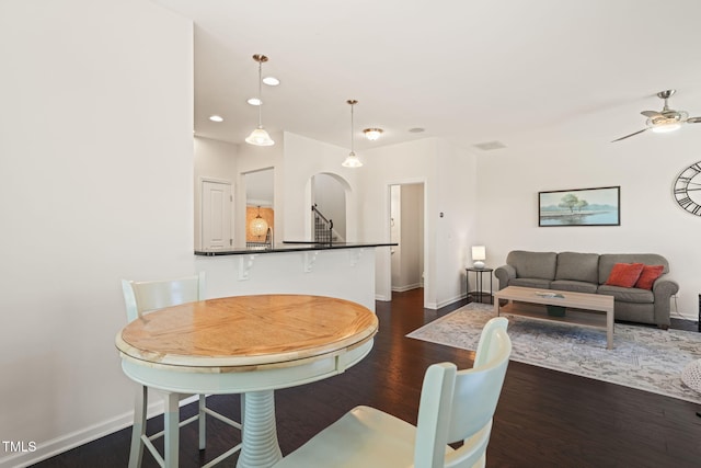 9141 Falkwood Rd, Raleigh, NC 27617 - dining space with dark wood-style floors, ceiling fan, and recessed lighting
