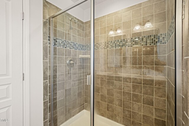 9141 Falkwood Rd, Raleigh, NC 27617 - bathroom featuring a shower stall