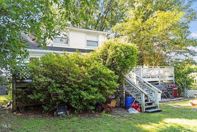 506 Currin St, Durham, NC 27703 - back of property featuring stairs, a yard, and a wooden deck