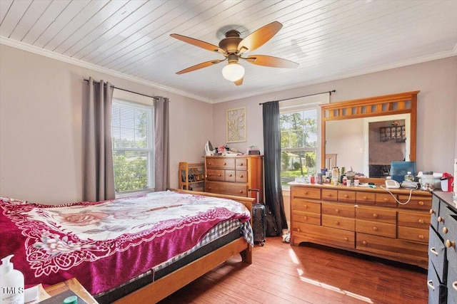 506 Currin St, Durham, NC 27703 - bedroom featuring light wood-style floors, crown molding, a ceiling fan, and wooden ceiling