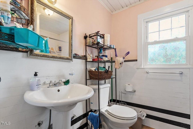 506 Currin St, Durham, NC 27703 - bathroom with crown molding and tile walls