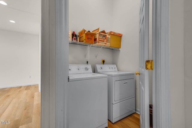 244 Sweet Bay Pl, Carrboro, NC 27510 - laundry room with washer and clothes dryer, light wood-style flooring, recessed lighting, and baseboards