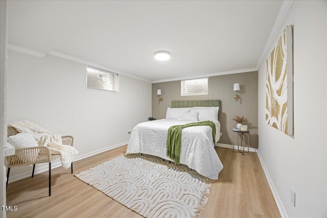 800 Camden Ave, Durham, NC 27701 - bedroom with light wood-style floors and crown molding