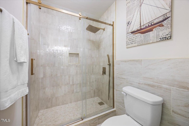 800 Camden Ave, Durham, NC 27701 - full bath featuring toilet, tile walls, a shower stall, and a wainscoted wall