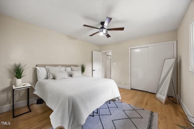 800 Camden Ave, Durham, NC 27701 - bedroom featuring light wood finished floors, a closet, and ceiling fan