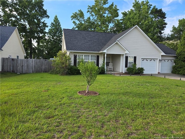 5516 Hall Glen Dr, Hope Mills, NC 28348 - view of front of home with a garage, concrete driveway, a porch, and roof with shingles