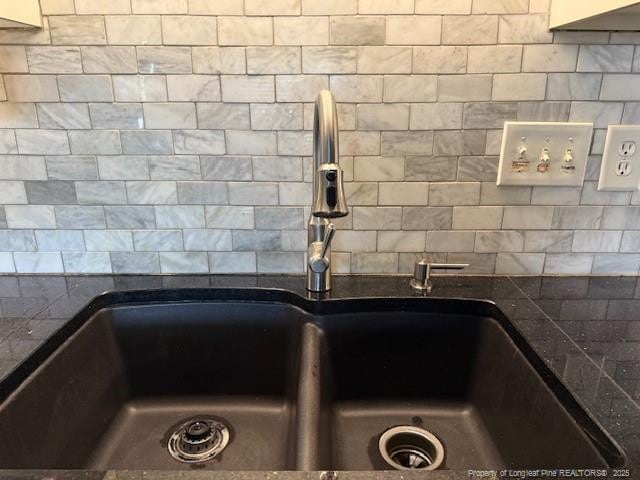 5516 Hall Glen Dr, Hope Mills, NC 28348 - kitchen view of dark countertops and tasteful backsplash