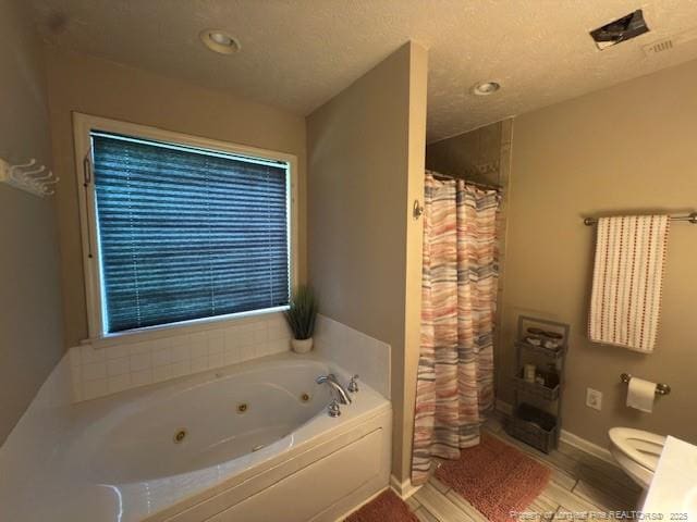 5516 Hall Glen Dr, Hope Mills, NC 28348 - full bath featuring a tub with jets, a shower with curtain, wood finished floors, and recessed lighting