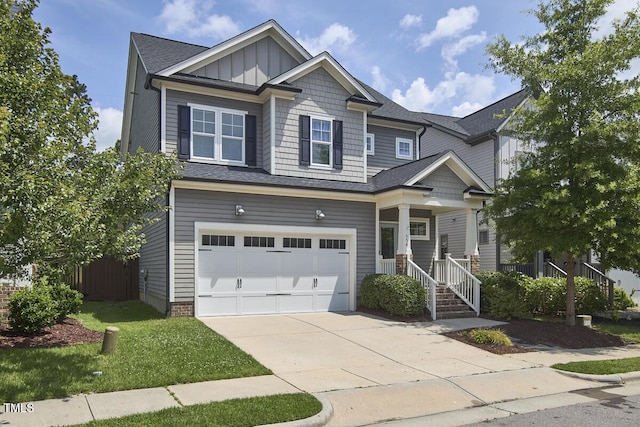 554 Beacon Ridge Blvd, Chapel Hill, NC 27516 - craftsman-style home with a garage, driveway, board and batten siding, and a shingled roof