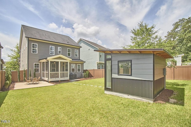 554 Beacon Ridge Blvd, Chapel Hill, NC 27516 - rear view of property featuring a patio area, a fenced backyard, and an outbuilding