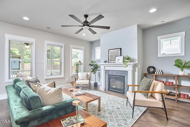 554 Beacon Ridge Blvd, Chapel Hill, NC 27516 - living area with a glass covered fireplace, recessed lighting, wood finished floors, and a ceiling fan