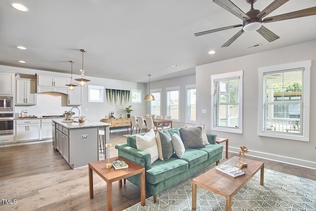 554 Beacon Ridge Blvd, Chapel Hill, NC 27516 - living area with light wood-style flooring, recessed lighting, and a ceiling fan