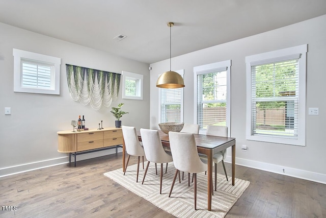 554 Beacon Ridge Blvd, Chapel Hill, NC 27516 - dining space with plenty of natural light and wood finished floors