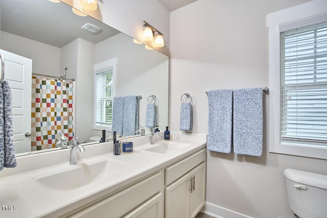 554 Beacon Ridge Blvd, Chapel Hill, NC 27516 - bathroom with double vanity and a shower with shower curtain