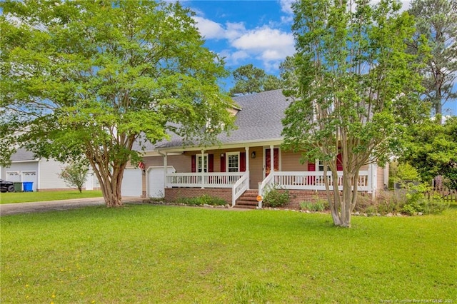 6745 Foxberry Rd, Fayetteville, NC 28314 - view of front of house featuring a porch, an attached garage, driveway, a front yard, and a shingled roof