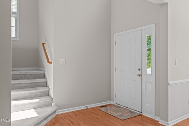 4804 Carmen Ln, Durham, NC 27707 - entrance foyer featuring wood finished floors and stairs