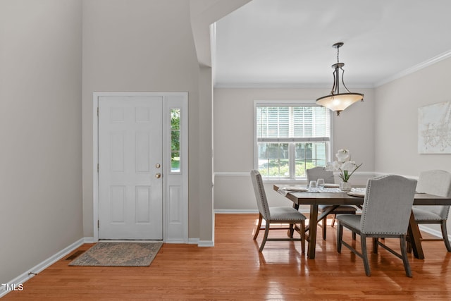 4804 Carmen Ln, Durham, NC 27707 - dining area with ornamental molding and light wood-style floors