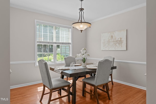 4804 Carmen Ln, Durham, NC 27707 - dining space featuring plenty of natural light, wood finished floors, and crown molding