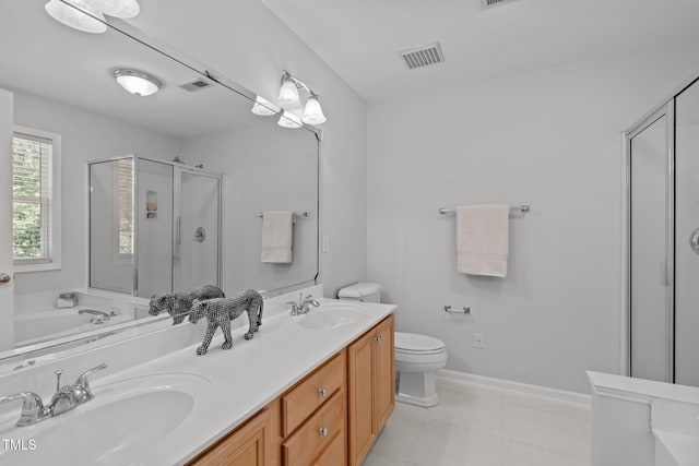4804 Carmen Ln, Durham, NC 27707 - bathroom with a shower stall, double vanity, and a garden tub