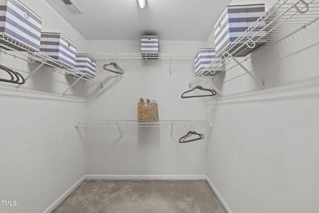 4804 Carmen Ln, Durham, NC 27707 - walk in closet with carpet flooring