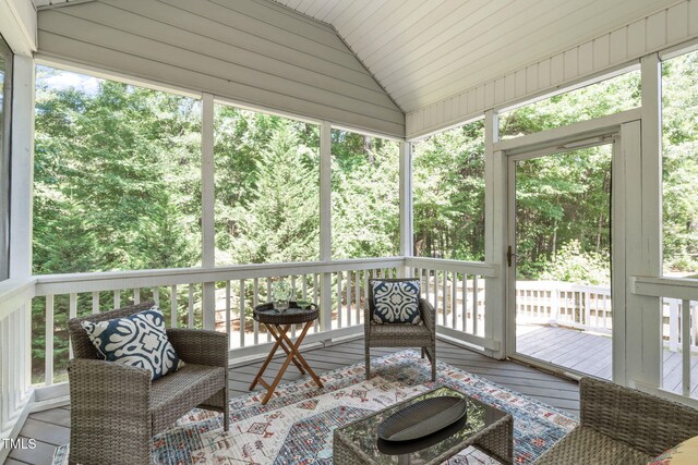 4804 Carmen Ln, Durham, NC 27707 - sunroom featuring vaulted ceiling and plenty of natural light