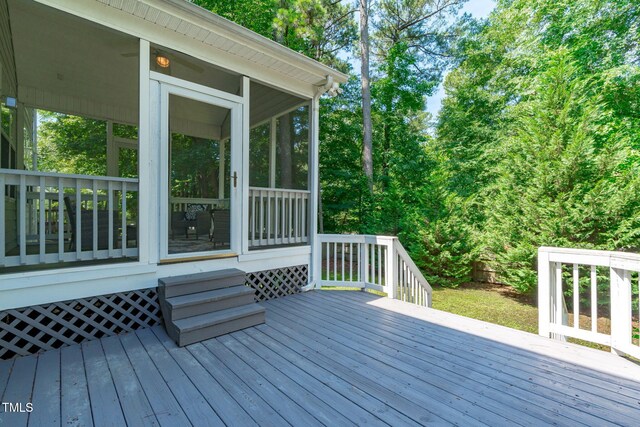 4804 Carmen Ln, Durham, NC 27707 - wooden deck featuring a sunroom