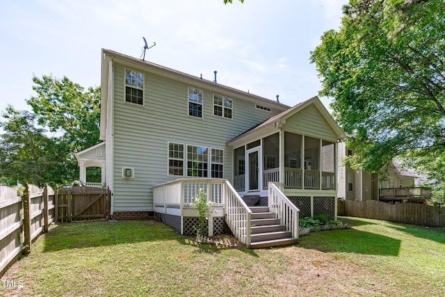 4804 Carmen Ln, Durham, NC 27707 - back of house featuring a sunroom, a fenced backyard, a gate, and stairway