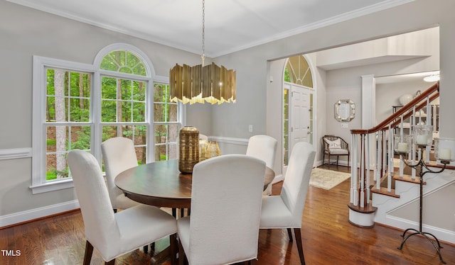 603 Edburton Ct, Hillsborough, NC 27278 - dining room featuring dark wood-type flooring, plenty of natural light, stairway, and crown molding