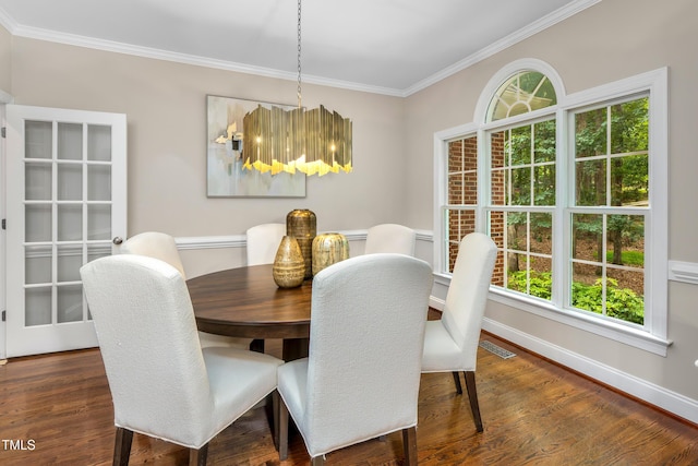 603 Edburton Ct, Hillsborough, NC 27278 - dining area with ornamental molding, plenty of natural light, and dark wood-style flooring