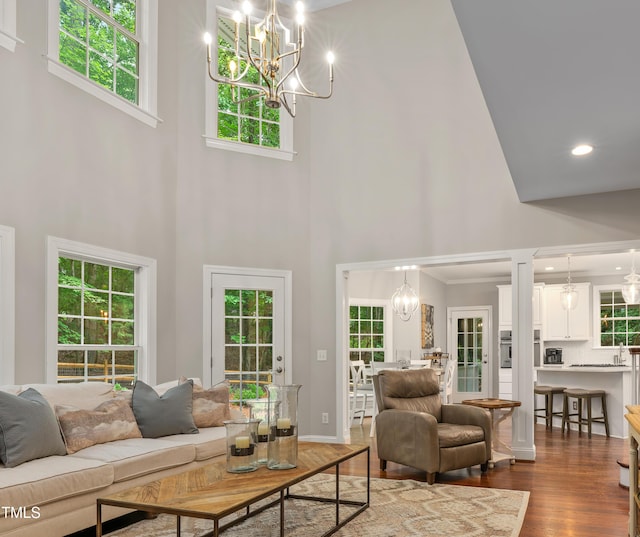 603 Edburton Ct, Hillsborough, NC 27278 - living area with a high ceiling, a chandelier, dark wood-type flooring, and recessed lighting