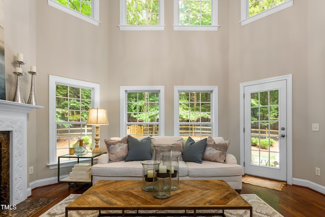 603 Edburton Ct, Hillsborough, NC 27278 - living room featuring a towering ceiling, wood finished floors, and a premium fireplace