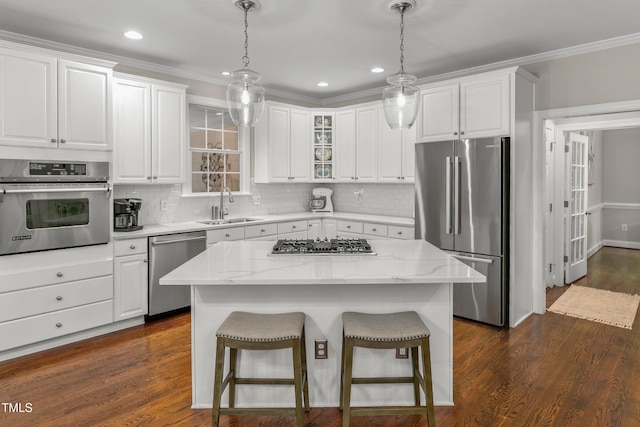 603 Edburton Ct, Hillsborough, NC 27278 - kitchen with stainless steel appliances, white cabinets, crown molding, decorative backsplash, and recessed lighting