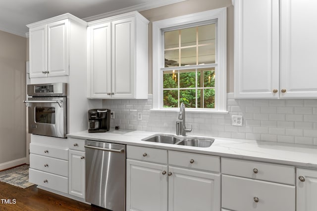 603 Edburton Ct, Hillsborough, NC 27278 - kitchen with stainless steel appliances, tasteful backsplash, white cabinetry, dark wood-style flooring, and ornamental molding
