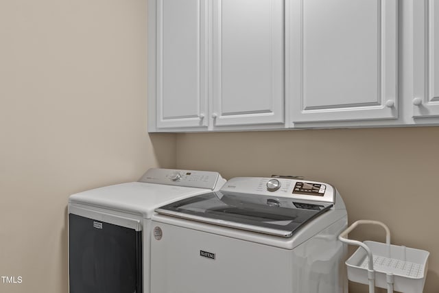 603 Edburton Ct, Hillsborough, NC 27278 - laundry room with washing machine and dryer and cabinet space
