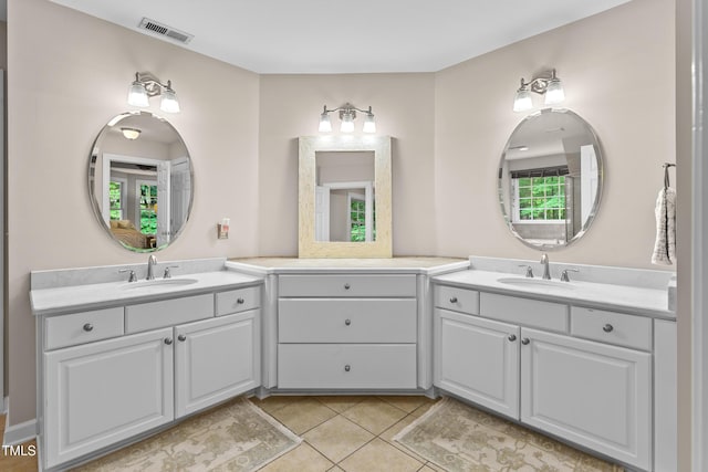 603 Edburton Ct, Hillsborough, NC 27278 - bathroom with two vanities and tile patterned floors