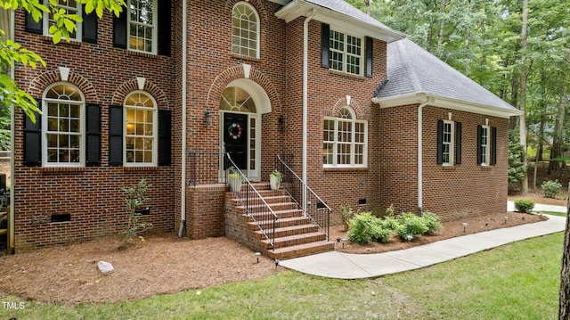 603 Edburton Ct, Hillsborough, NC 27278 - view of front facade featuring brick siding, a shingled roof, and crawl space