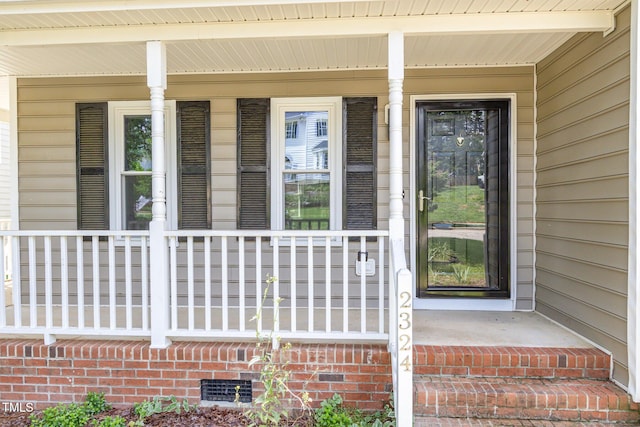 2324 Dahlgreen Rd, Raleigh, NC 27615 - doorway to property featuring covered porch