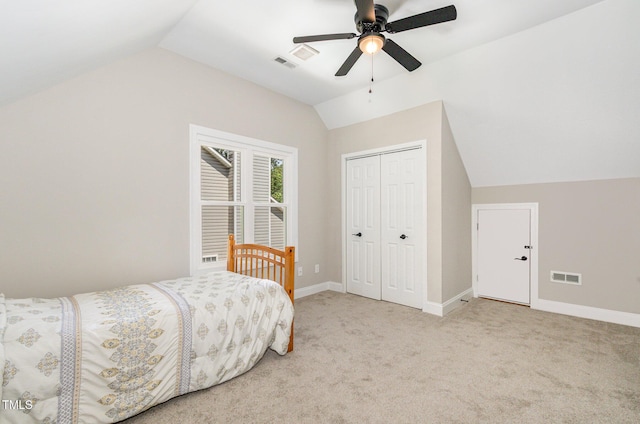 2324 Dahlgreen Rd, Raleigh, NC 27615 - bedroom featuring vaulted ceiling, light carpet, a closet, and a ceiling fan