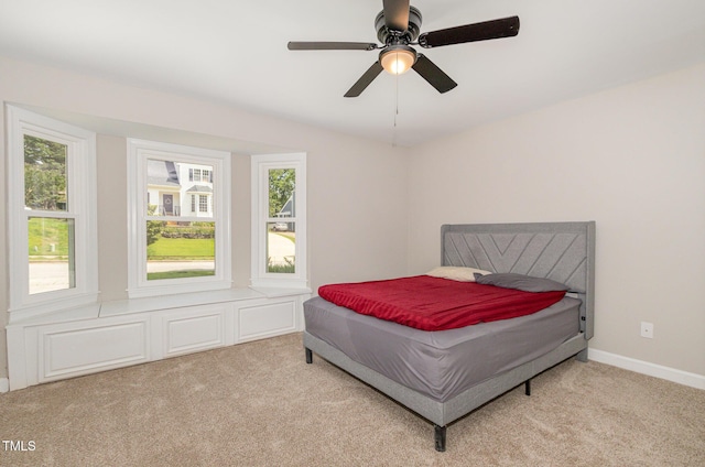 2324 Dahlgreen Rd, Raleigh, NC 27615 - bedroom featuring multiple windows, carpet floors, and ceiling fan