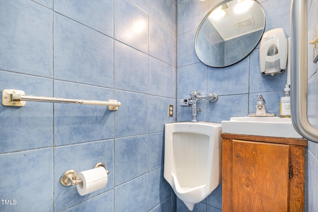 2817 Henslowe Dr, Raleigh, NC 27603 - bathroom featuring tile walls and vanity