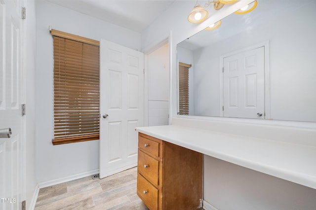 2817 Henslowe Dr, Raleigh, NC 27603 - bathroom featuring vanity and wood finished floors