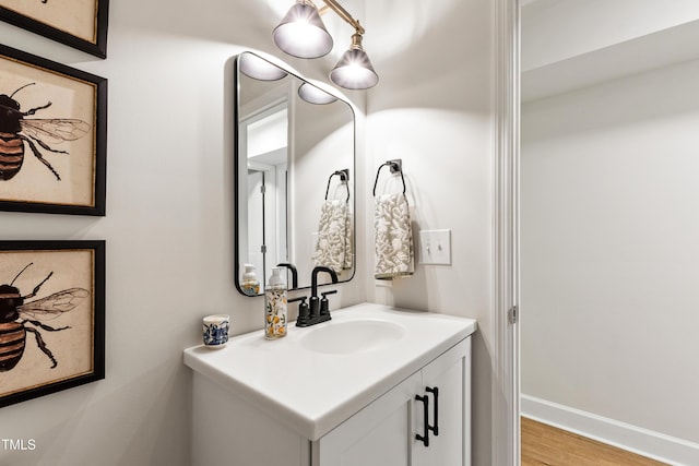 433 Rosehaven Dr, Raleigh, NC 27609 - bathroom featuring vanity and wood finished floors