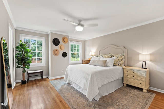 433 Rosehaven Dr, Raleigh, NC 27609 - bedroom featuring light wood-style flooring, ornamental molding, and ceiling fan